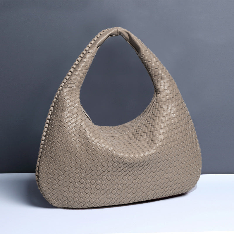 Crescent shaped women's bag hand woven hand-held dumpling bag fashionable single shoulder armpit bag